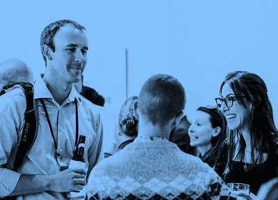 Group of people happily talking to each other